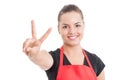 Portrait of smiling attractive female merchandiser on supermarket