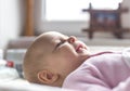 Portrait of a smiling baby laying Royalty Free Stock Photo