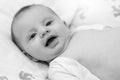 Portrait of smiling baby, black and white Royalty Free Stock Photo