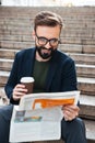 Portrait of a smiling bearded man sitting Royalty Free Stock Photo