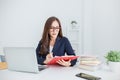 Portrait of smiling beautiful business asian woman working in office using computer. Royalty Free Stock Photo