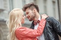 Portrait of smiling beautiful girl and her handsome boyfriend. Woman in casual summer jeans clothes. Happy cheerful family. Female