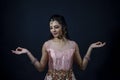 Portrait of smiling beautiful indian girl wearing traditional purple clothes Royalty Free Stock Photo