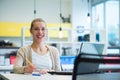 Portrait of smiling beautiful young businesswoman or CEO looking at camera, happy female boss posing making headshot picture for