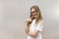 Portrait of a smiling beautiful young girl with glasses. Smart child. Nerdy