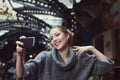 Portrait of a smiling beautiful young woman making selfie photo with her smartphone Royalty Free Stock Photo