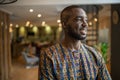 Portrait smiling black african businessman wearing traditional clothing