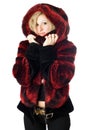 Portrait of smiling blond woman in fur jacket Royalty Free Stock Photo