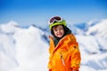 Portrait of smiling boy with ski mask and helmet Royalty Free Stock Photo