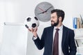 portrait of smiling businessman holding soccer ball Royalty Free Stock Photo