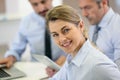 Portrait of smiling businesswoman attending work meeting Royalty Free Stock Photo