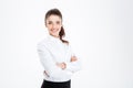 Portrait of a smiling businesswoman standing with arms folded Royalty Free Stock Photo