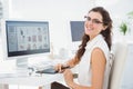 Portrait of smiling businesswoman using digitizer