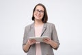 Portrait of a smiling businesswoman using a tablet computer. Royalty Free Stock Photo