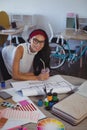 Portrait of smiling businesswoman working in creative office Royalty Free Stock Photo