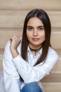 Portrait of smiling Caucasian brunette young beautiful girl woman model with long dark hair and brown eyes Royalty Free Stock Photo