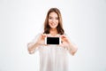 Portrait of a smiling cheerful woman showing blank smartphone screen Royalty Free Stock Photo
