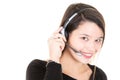 Portrait of smiling cheerful young support phone operator in headset isolated over white background Royalty Free Stock Photo