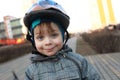 Smiling child with crash helmet