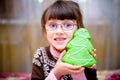 Portrait of smiling child girl with gingerbread