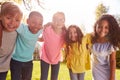 Portrait Of Smiling Children Outdoors At Home Looking Into Camera Royalty Free Stock Photo