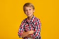 Portrait of smiling confident calm caucasian teen boy student with crossed arms Royalty Free Stock Photo