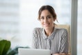 Portrait of smiling confident female boss looking at camera Royalty Free Stock Photo