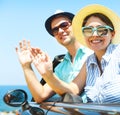Portrait of a smiling couple at beach in the car Royalty Free Stock Photo