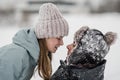 Portrait of smiling couple in love looking at each other. Young happy couple walking in winter Royalty Free Stock Photo
