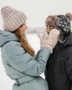 Portrait of smiling couple in love looking at each other. Young happy couple walking in winter Royalty Free Stock Photo