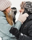 Portrait of smiling couple in love looking at each other. Young happy couple walking in winter Royalty Free Stock Photo