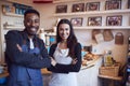 Portrait Of Smiling Couple Running Coffee Shop Together Standing Behind Counter Royalty Free Stock Photo