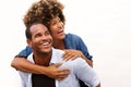 Smiling couple standing in embrace on white background Royalty Free Stock Photo