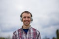 Portrait of a smiling customer service operator wearing a headset Royalty Free Stock Photo