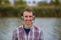 Portrait of a smiling customer service operator wearing a headset Royalty Free Stock Photo
