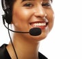 Portrait of smiling customer support female phone worker, over w Royalty Free Stock Photo