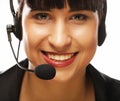 Portrait of smiling customer support female phone worker, over w Royalty Free Stock Photo