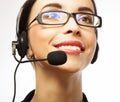 Portrait of smiling customer support female phone worker, over w Royalty Free Stock Photo