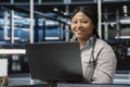 Portrait of smiling data center software developer using artificial intelligence Royalty Free Stock Photo