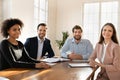 Portrait of smiling diverse employees posing in office Royalty Free Stock Photo