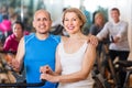 Elderly couple exercising in gym Royalty Free Stock Photo