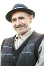 Portrait of smiling elderly man