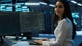 Portrait of smiling engineer overseeing data center