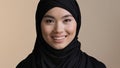 Portrait smiling executive business woman asian muslim islamic girl casual wear hijab looking at camera smile happy in Royalty Free Stock Photo