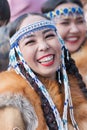 Portrait of smiling expression female in national clothing indigenous inhabitants of Kamchatka. Celebration Koryak