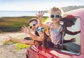 Portrait of a smiling family with two children at beach in the c Royalty Free Stock Photo