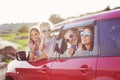 Portrait of a smiling family with two children at beach in the c Royalty Free Stock Photo