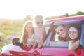 Portrait of a smiling family with two children at beach in the c Royalty Free Stock Photo