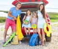 Portrait of a smiling family with two children at beach Royalty Free Stock Photo