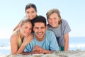 Portrait of a smiling famiy at the beach Royalty Free Stock Photo